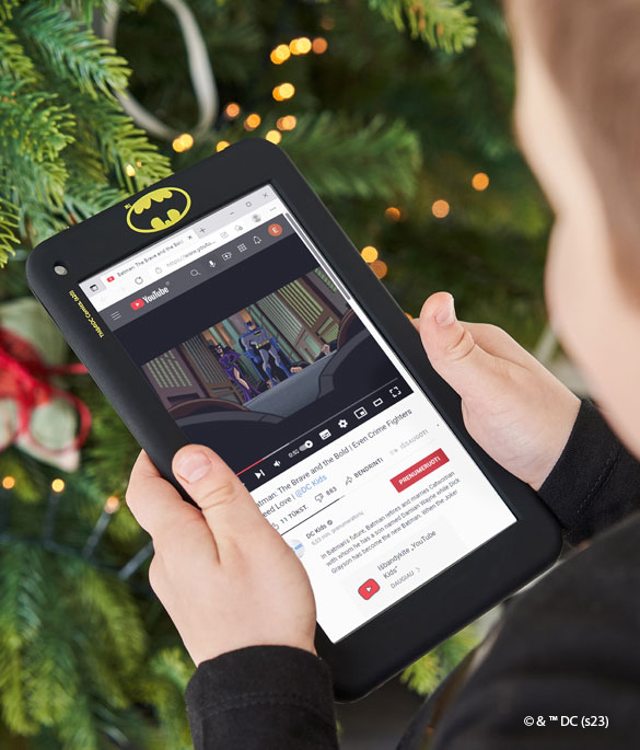 Child playing Hero tablet Batman