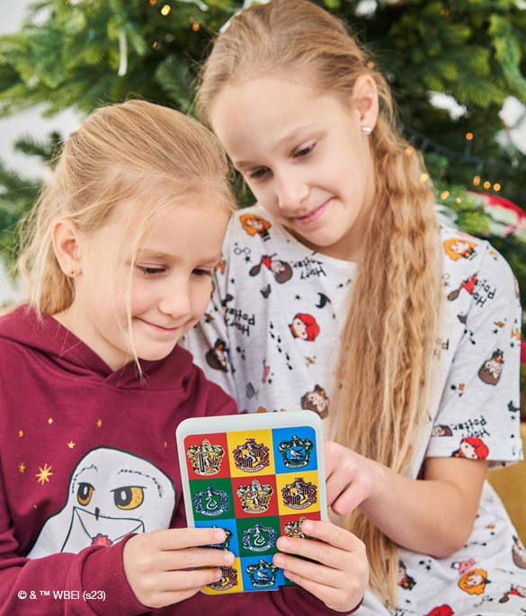 Child playing Hero tablet Hogwarts