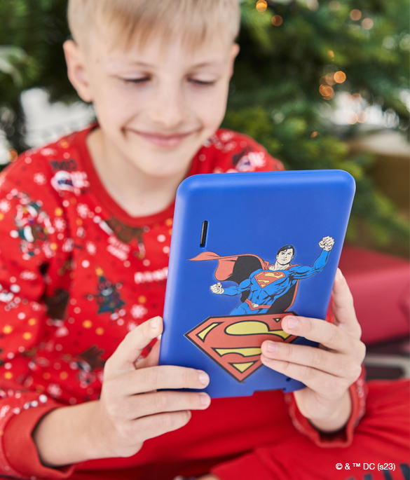 Child playing Hero tablet Batman